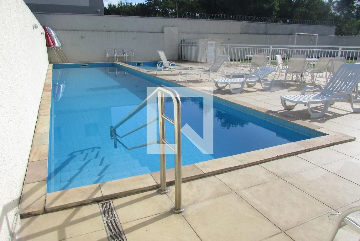 2-bedroom apartment in a building with a pool — photo 5