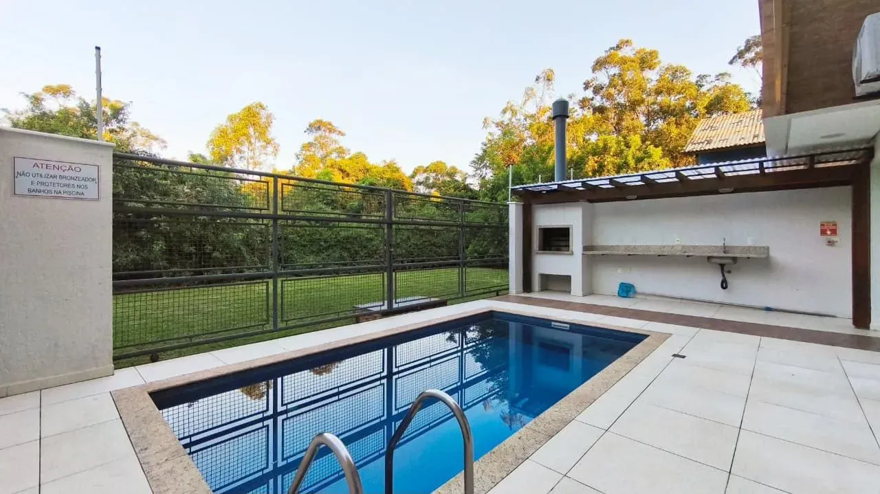 2-bedroom apartment in a building with a pool — photo 21