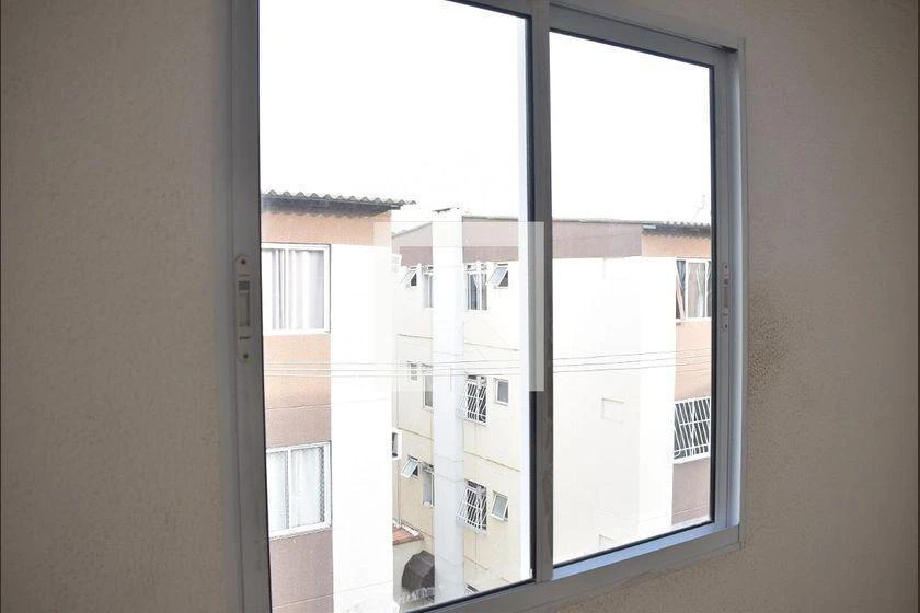 2-bedroom apartment in a building with a pool — photo 16