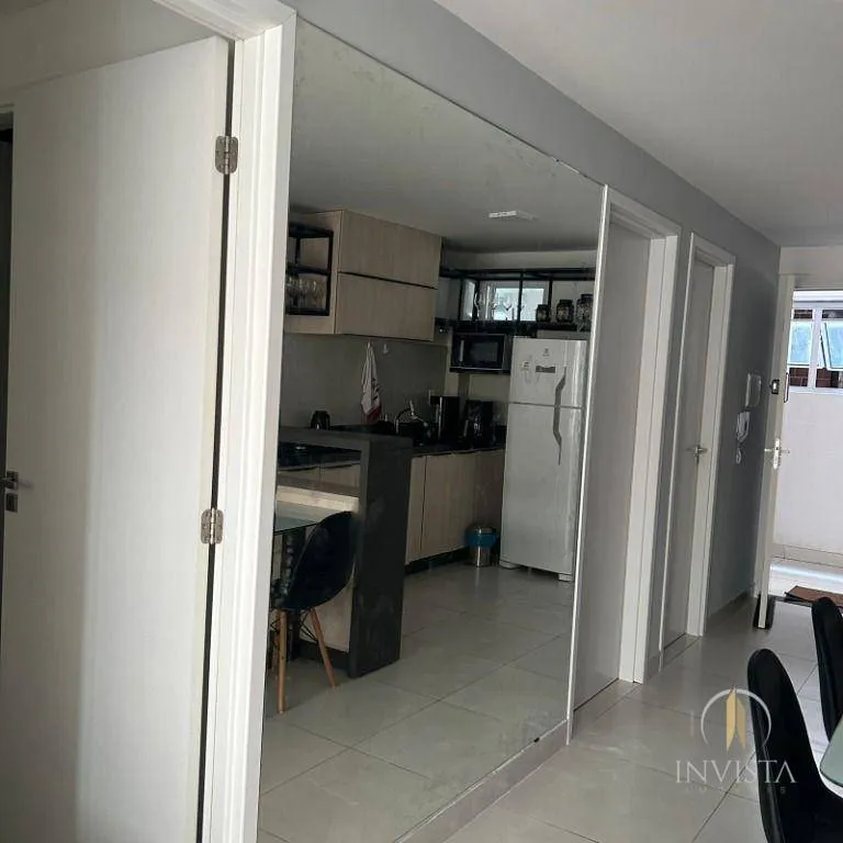 2-bedroom apartment in a building with a pool — photo 3