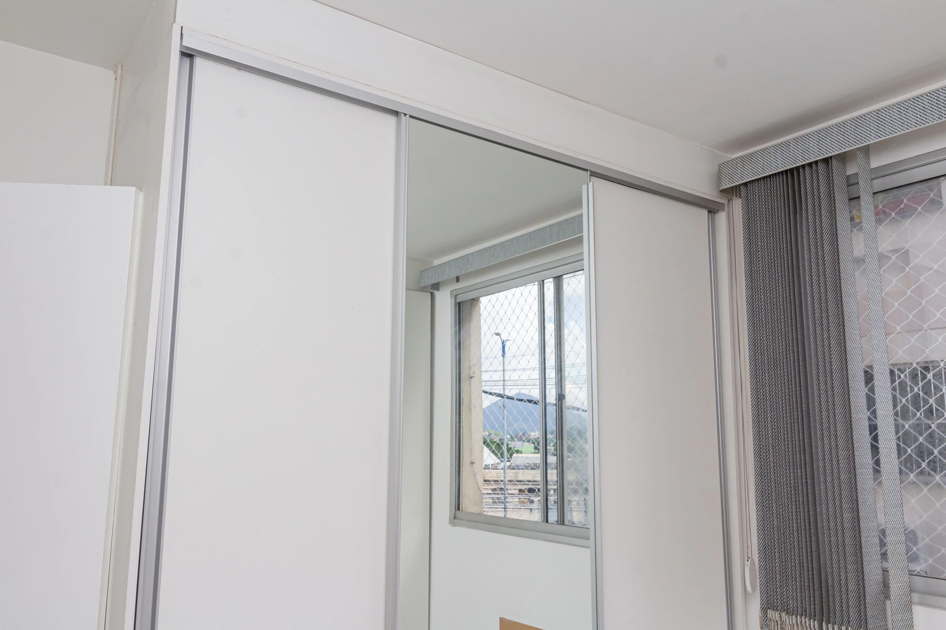 2-bedroom apartment in a building with a pool — photo 49