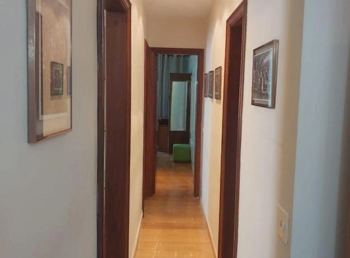 Furnished 3-bedroom apartment with desk workspace — photo 6