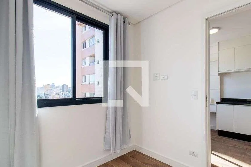 Unfurnished 1-bedroom apartment with a compact kitchen — photo 12