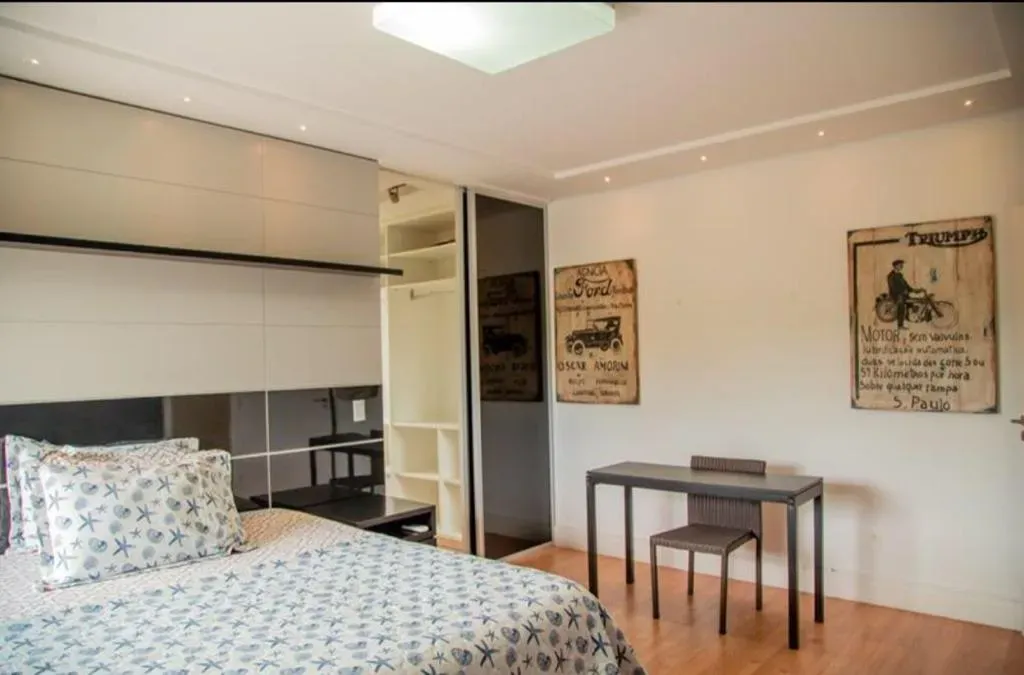 Casa com 6 suítes e área de piscina compartilhada — photo 18