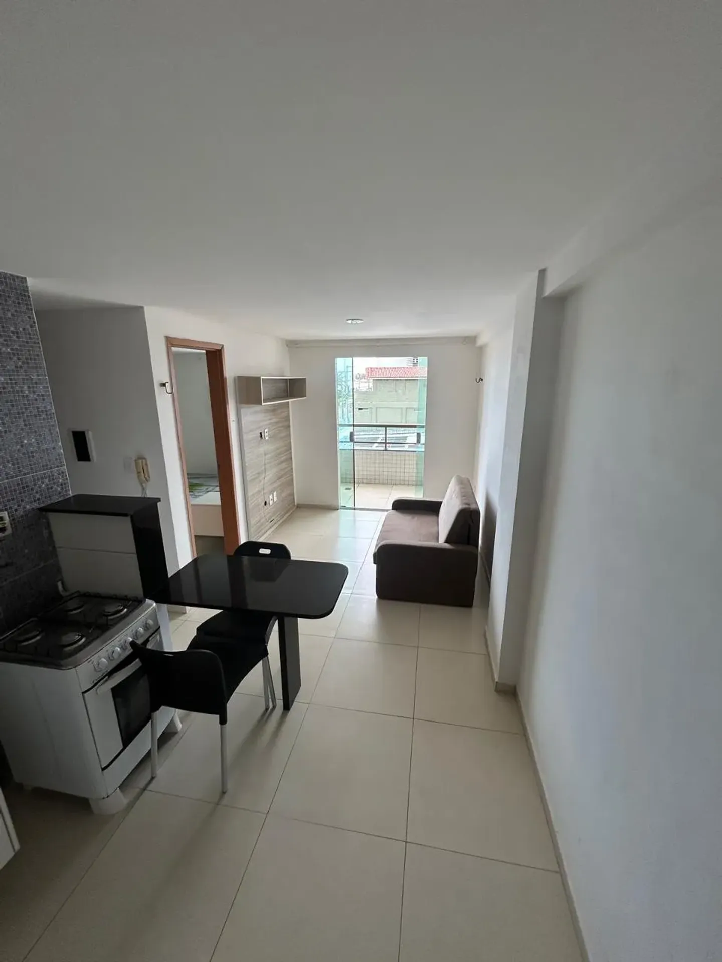 1-bedroom apartment with balcony and shared pool area — photo 4
