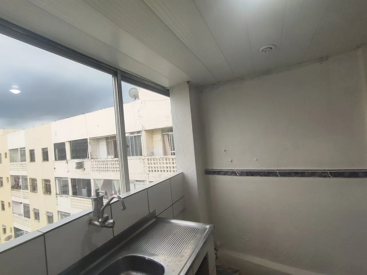 2-bedroom apartment in a building with a pool — photo 2