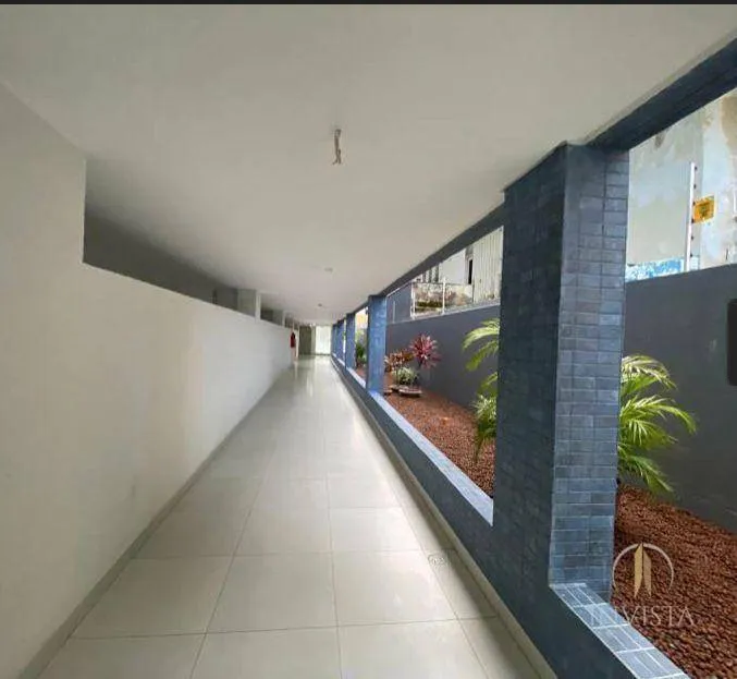 2-bedroom apartment in a building with a pool — photo 9