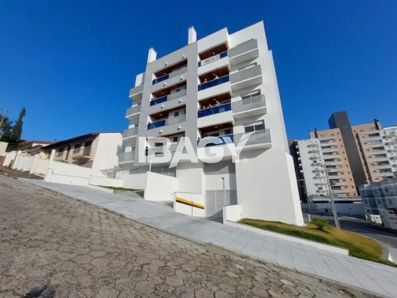 2-bedroom apartment in a building with a pool — photo 9