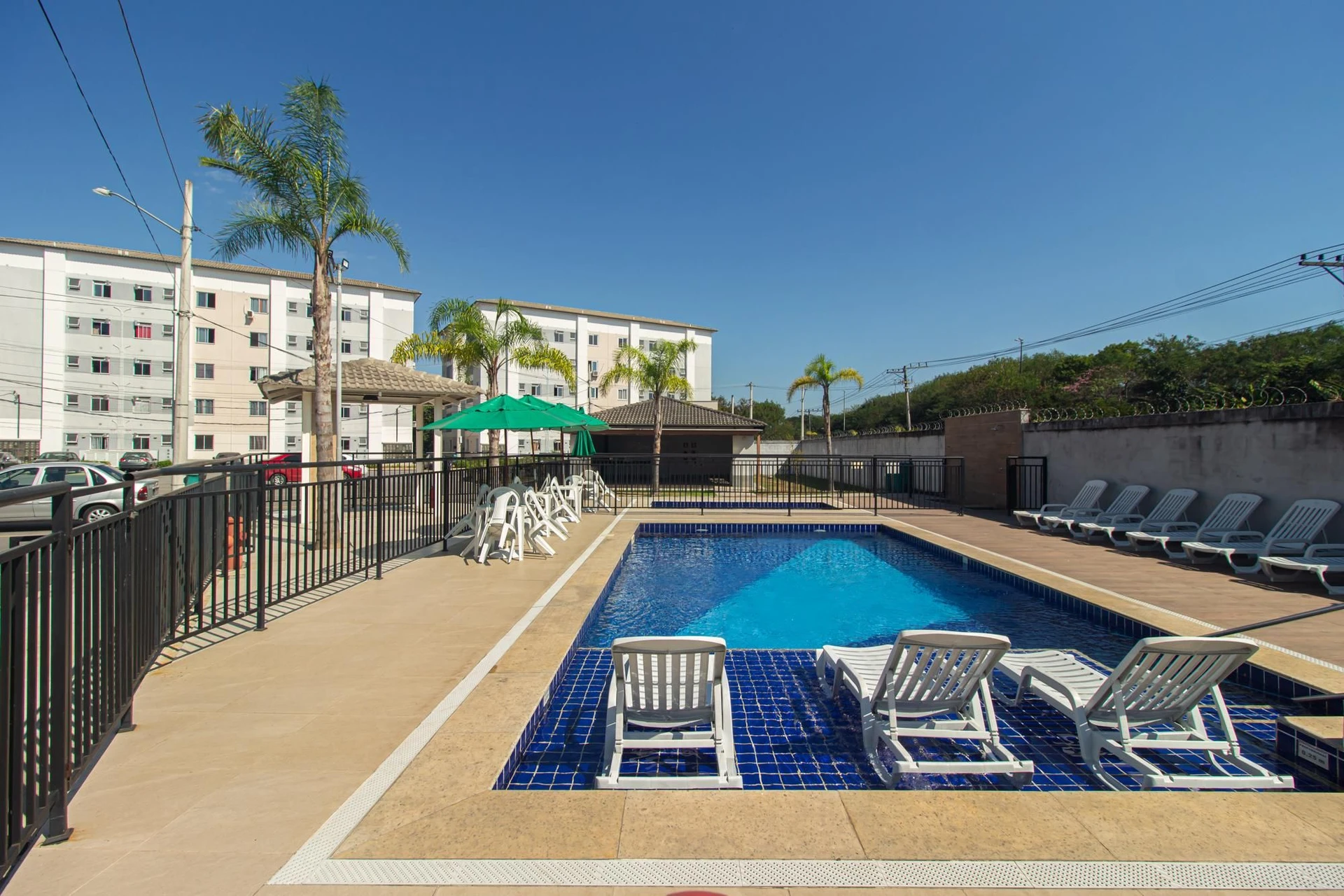 2-bedroom apartment in a building with a pool