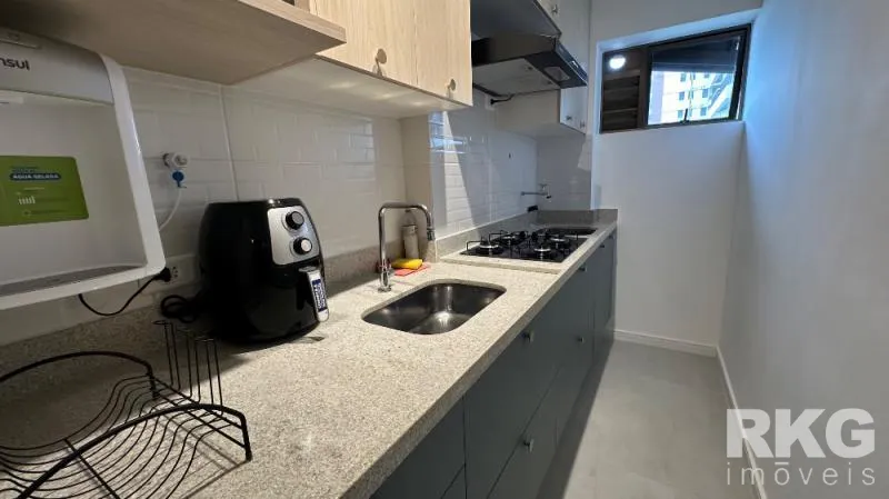 Furnished 1-bedroom apartment with an open-plan kitchen — photo 12