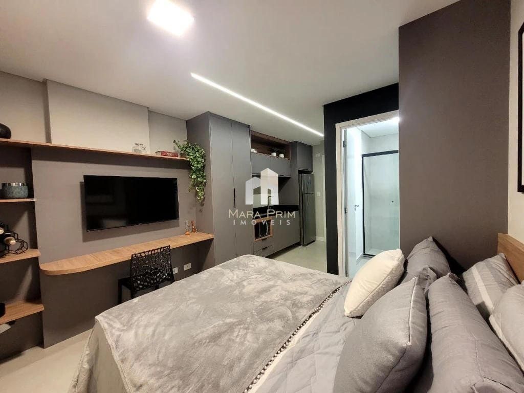 21 m² studio with a home office and a washing machine — photo 5