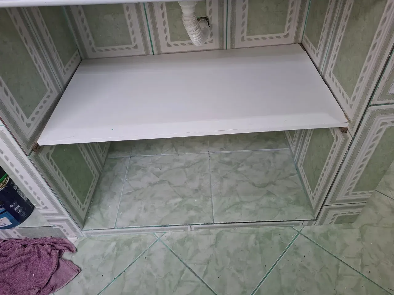 1-bedroom apartment with tiled floors and glass shower — photo 9