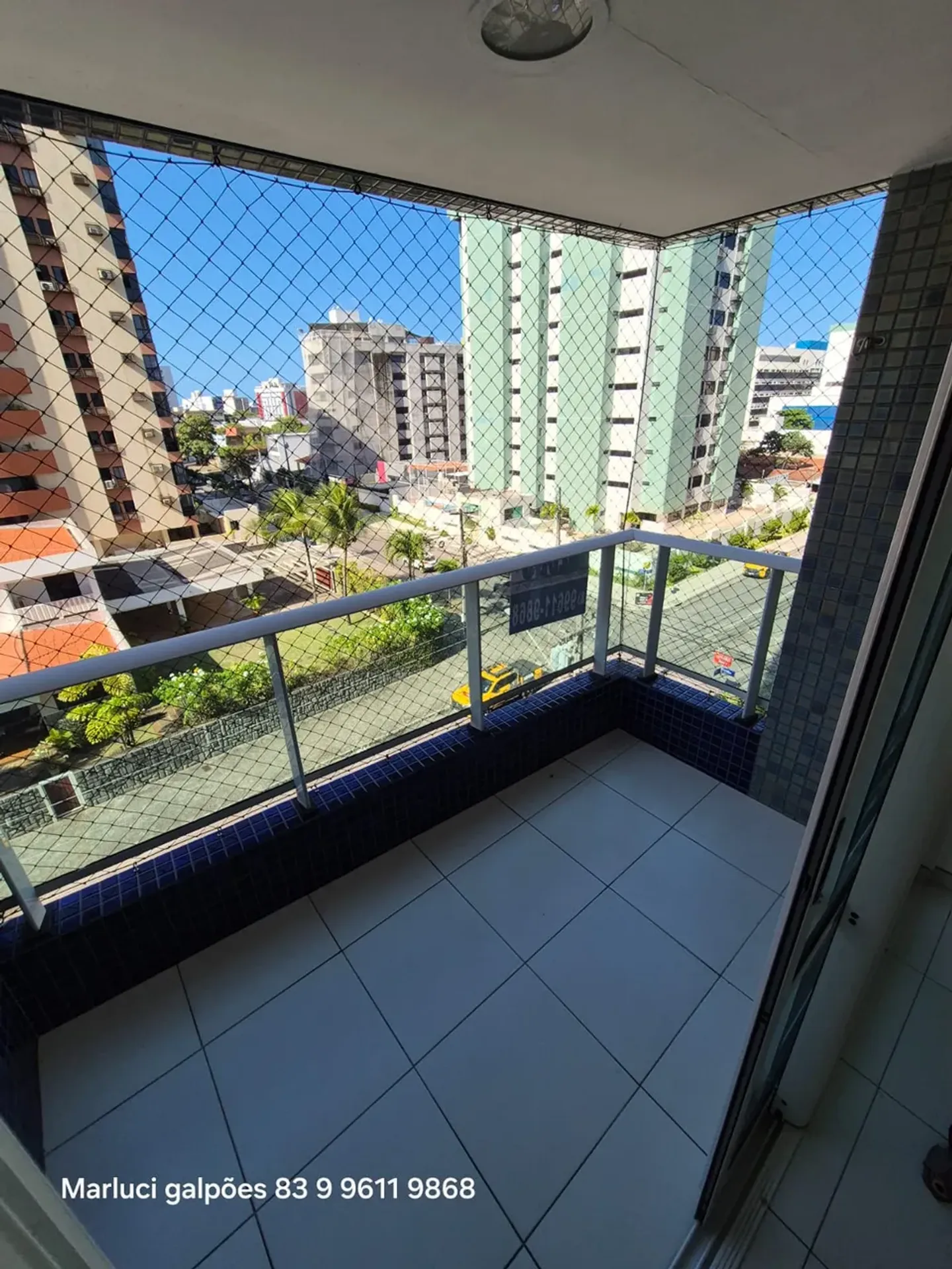 2-bedroom apartment in a building with a pool