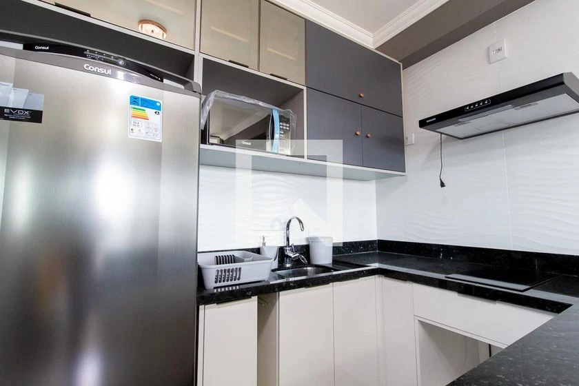 Studio mobiliado com quarto e cozinha integrada — photo 12