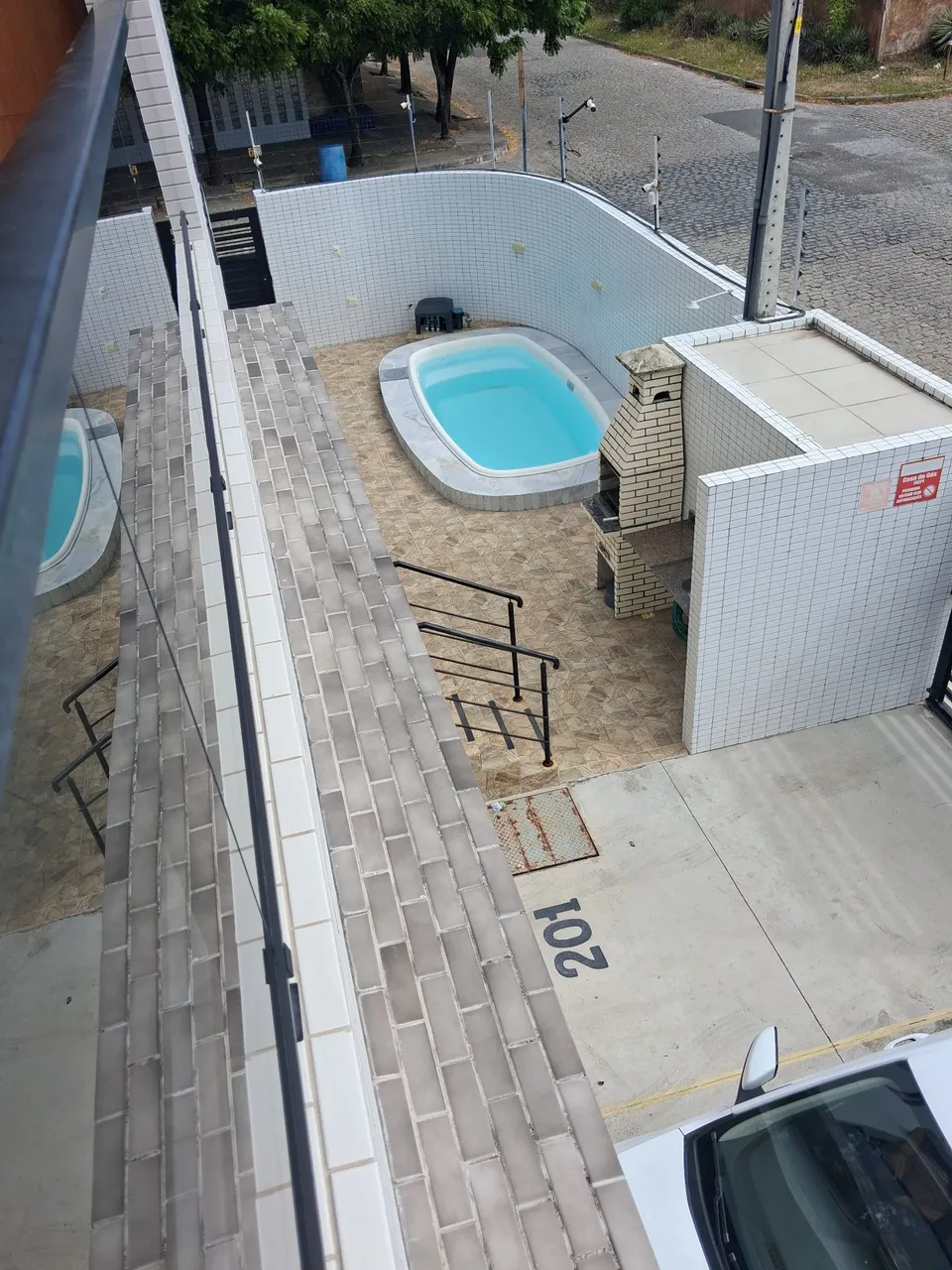 2-bedroom apartment in a building with a pool — photo 17