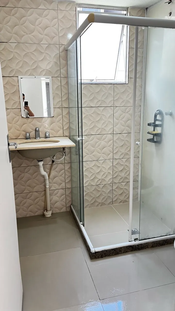 2-bedroom apartment in a building with a pool — photo 5
