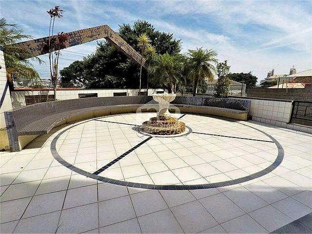 One-bedroom apartment in a building with a pool — photo 14