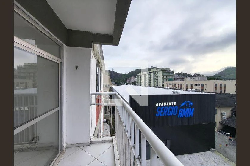 2-bedroom apartment in a building with a pool — photo 3