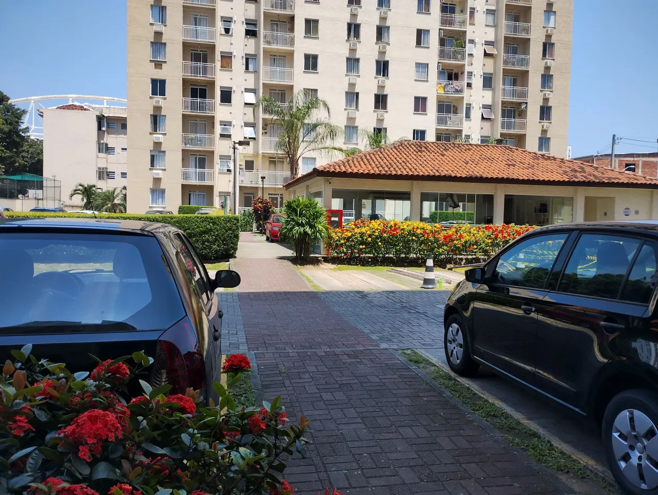 2-bedroom apartment in a building with a pool — photo 14