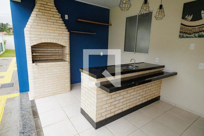 2-bedroom rental apartment with balcony sink and grill — photo 22