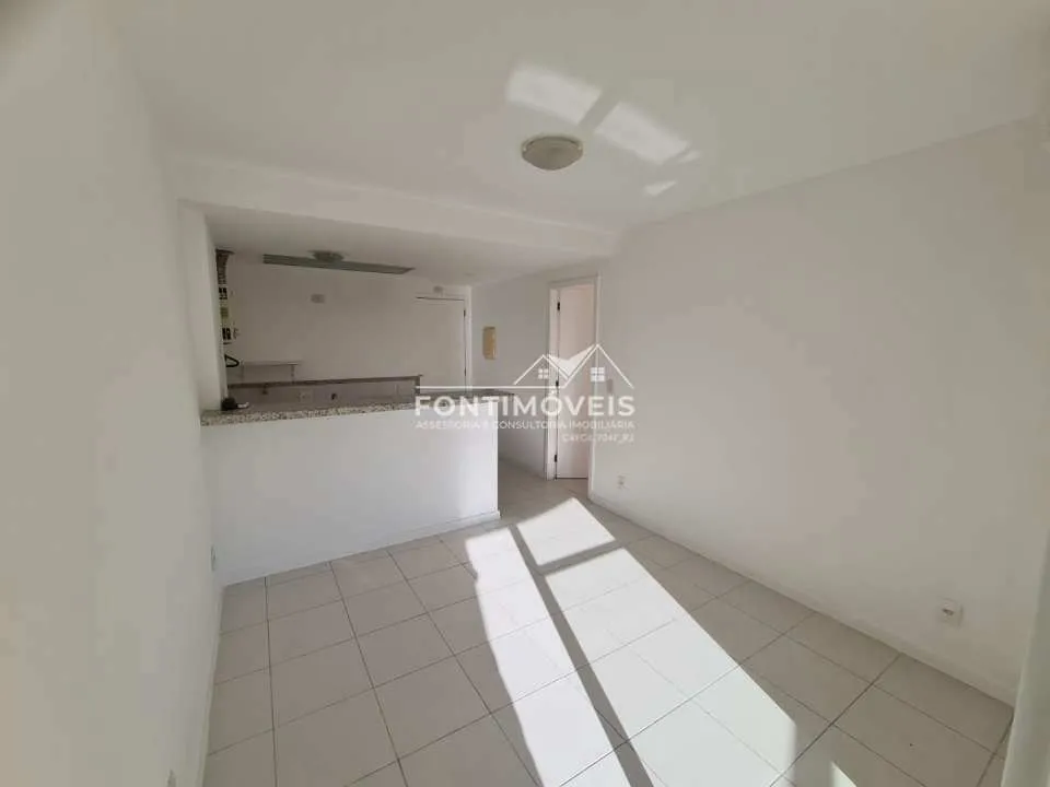 One-bedroom apartment in a building with a pool — photo 8