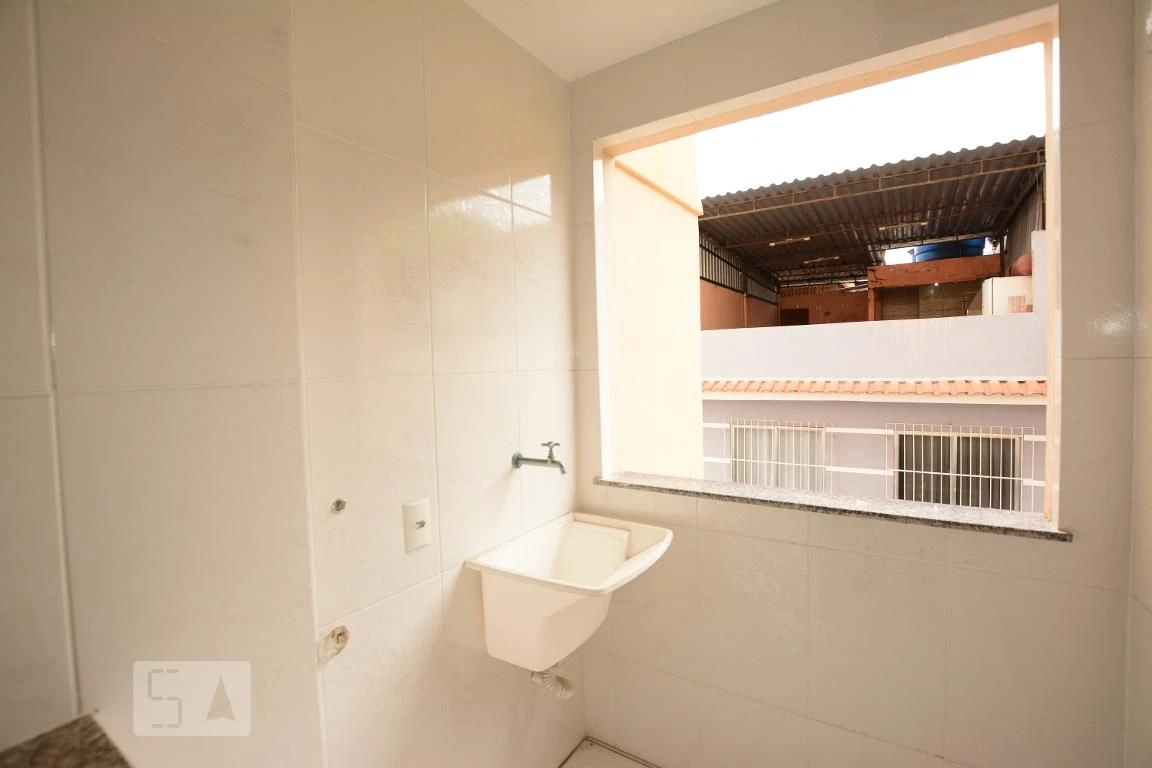 2-bedroom apartment with balcony sink and utility area — photo 39
