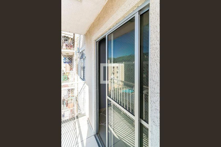 2-bedroom apartment in a building with a pool