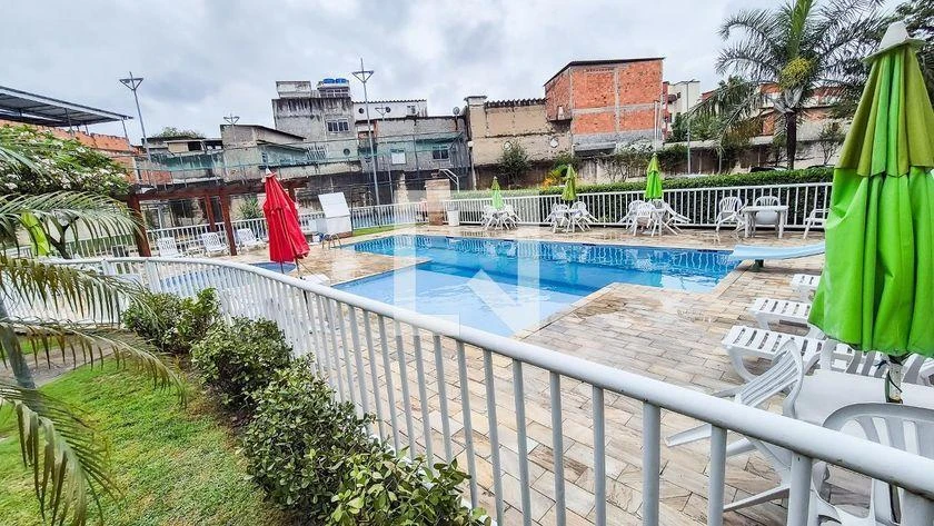 2-bedroom apartment in a building with a pool — photo 26