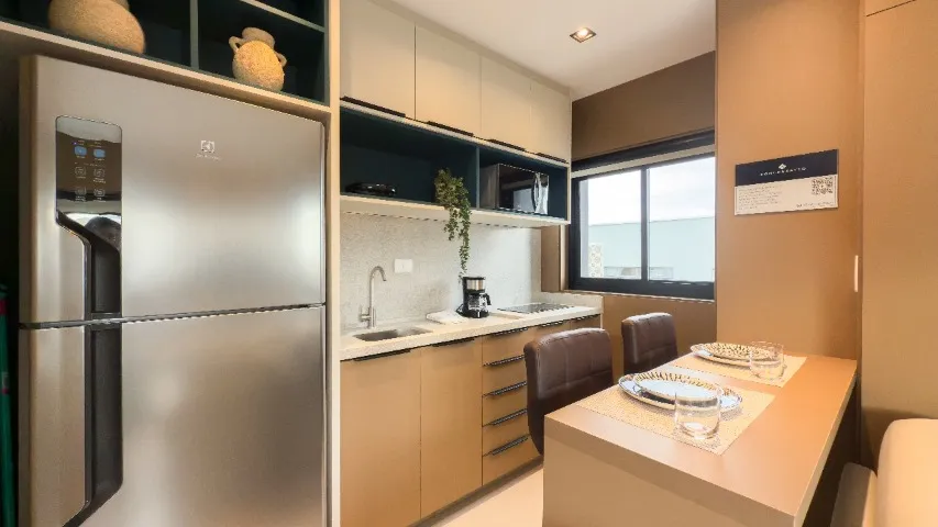 Furnished studio with open-plan kitchen and balcony — photo 9