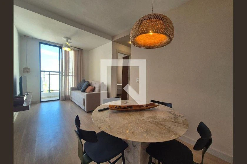 2-bedroom apartment in a building with a pool