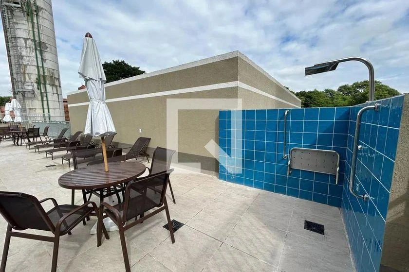 2-bedroom apartment in a building with a pool — photo 12