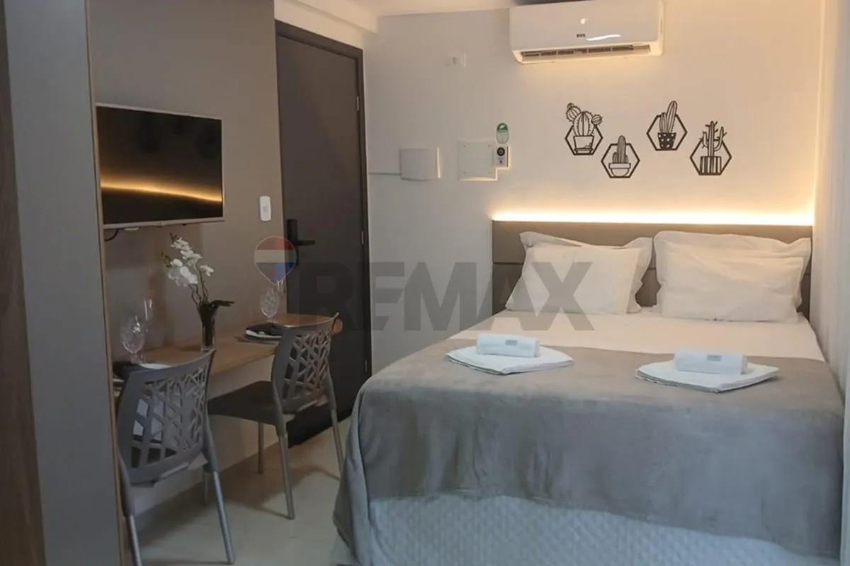 One-bedroom apartment in a building with a pool — photo 3