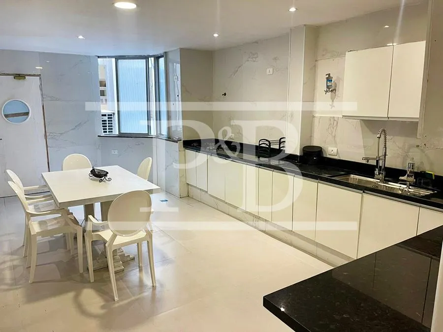 Furnished 4-bedroom apartment with open-plan kitchen — photo 22