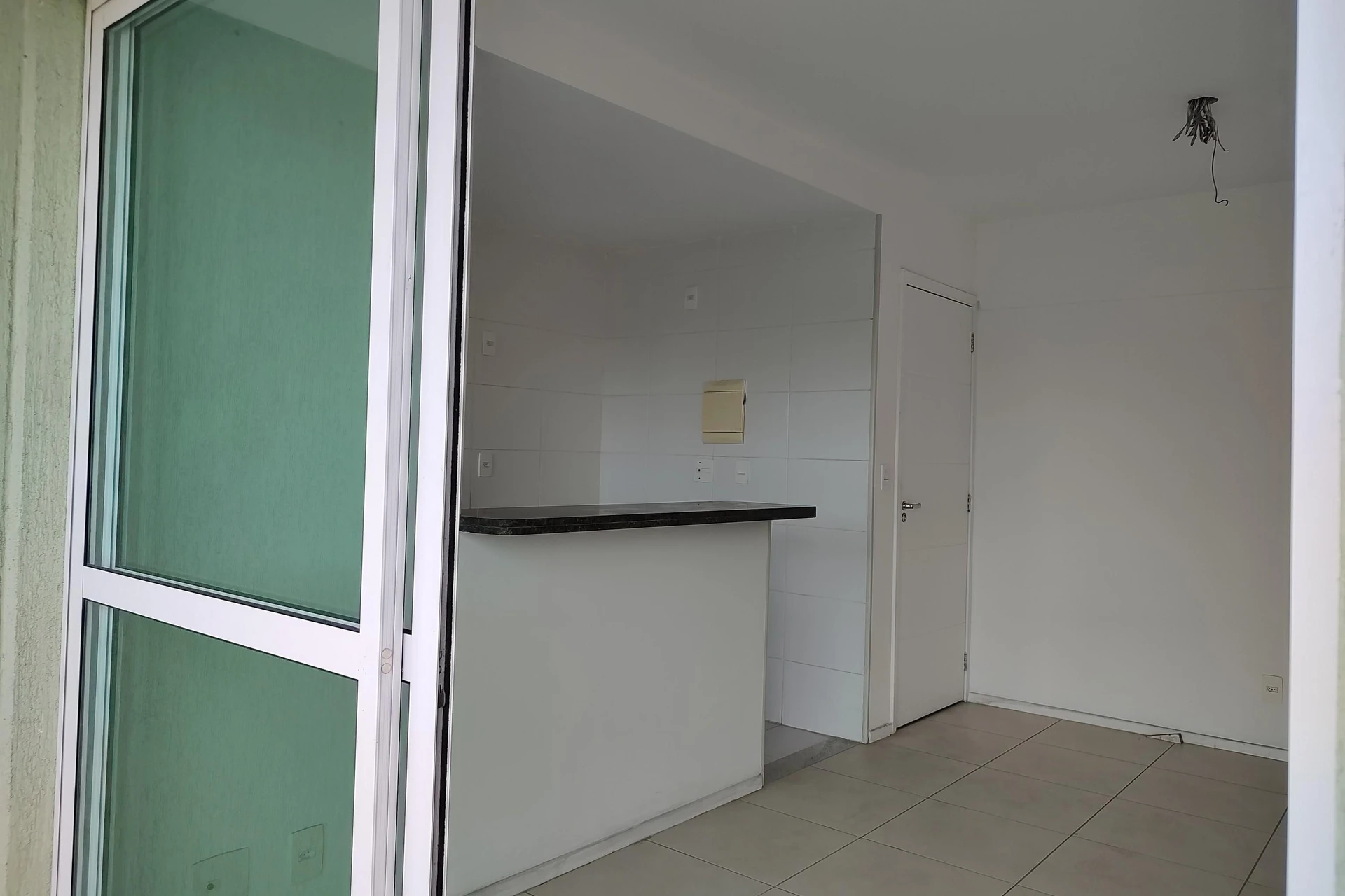 Unfurnished apartment with an open-plan kitchen and balcony — photo 19
