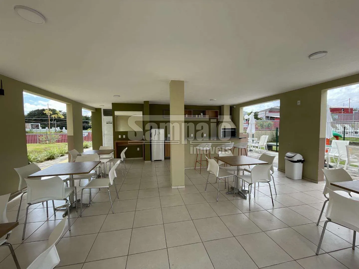 2-bedroom apartment in a building with a pool — photo 14