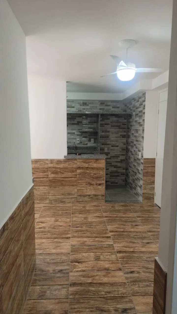 2-bedroom apartment in a building with a pool — photo 13
