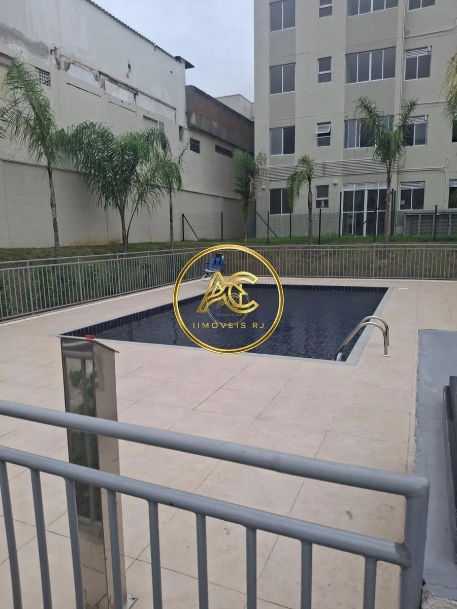 2-bedroom apartment in a building with a pool — photo 12