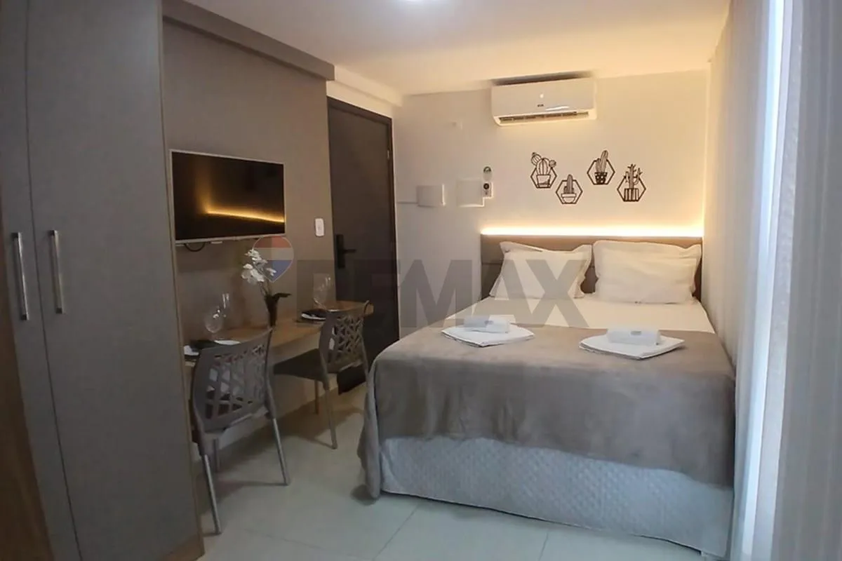 One-bedroom apartment in a building with a pool — photo 16