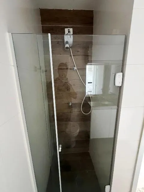 1-bedroom apartment with open-plan kitchen and parking — photo 10