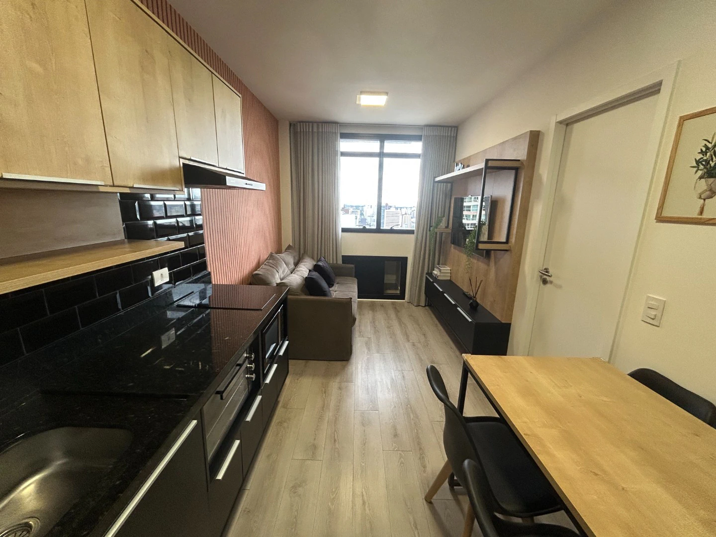 Apartamento de 1 dormitório com cozinha americana integrada — photo 3