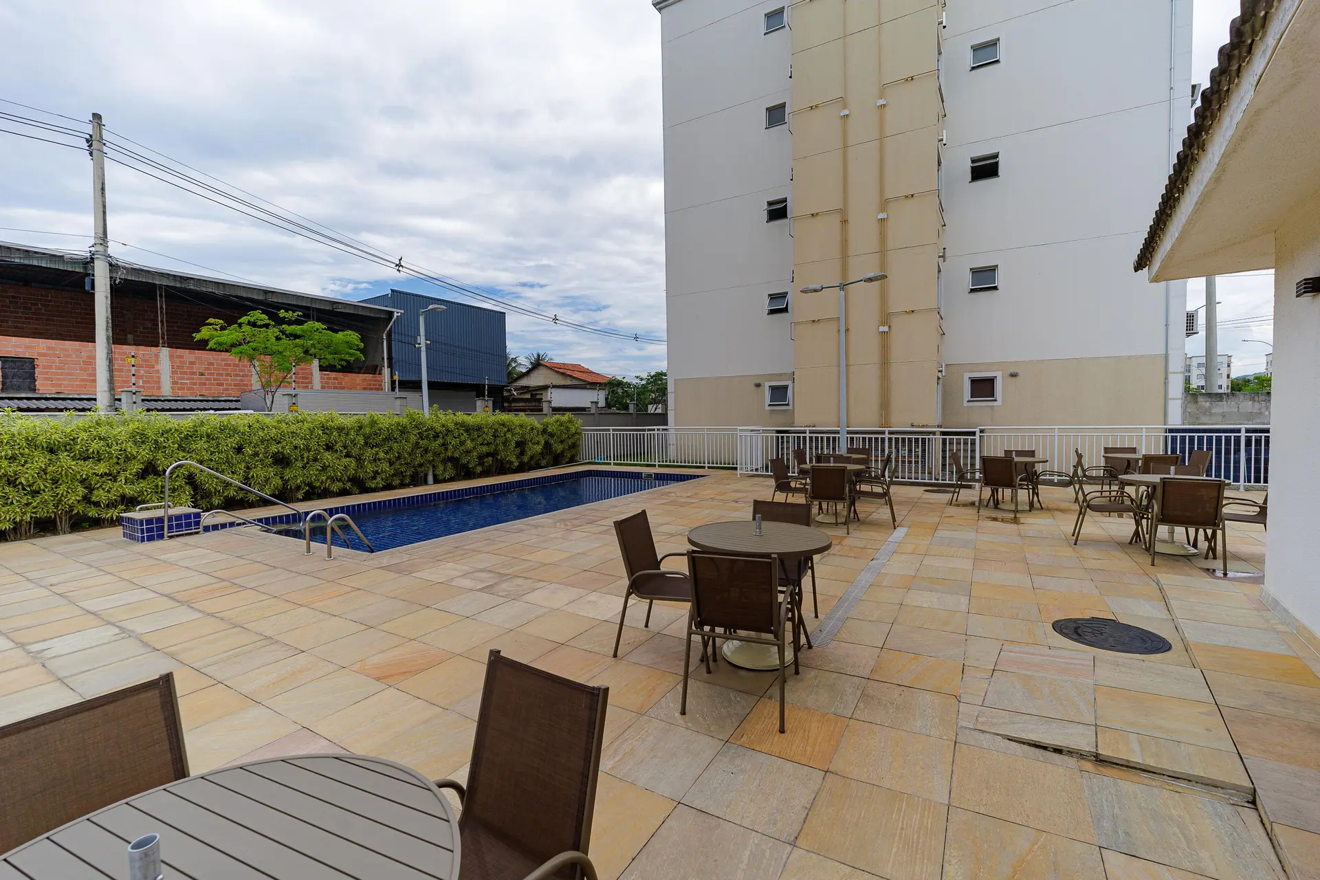 2-bedroom apartment in a building with a pool — photo 17