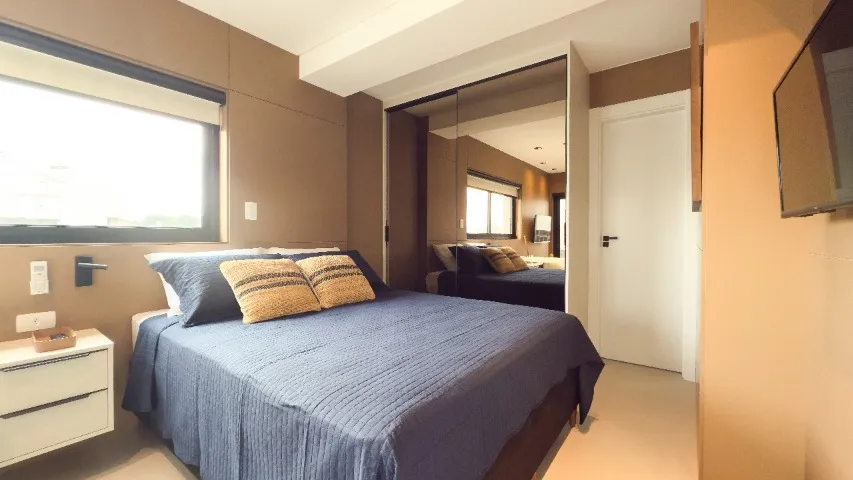 Furnished studio with open-plan kitchen and balcony — photo 8