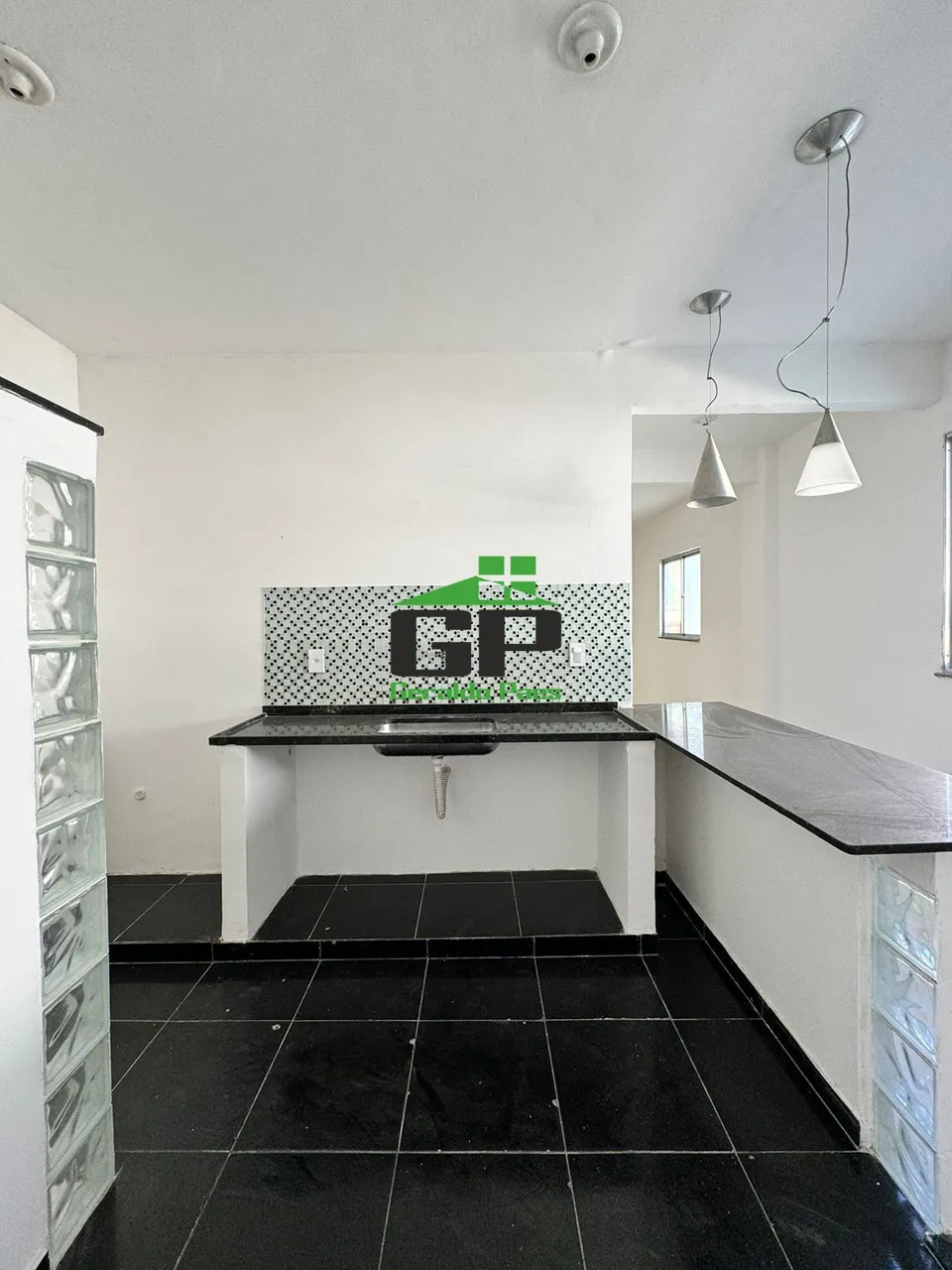 1-bedroom apartment with open-plan kitchen and balcony — photo 2