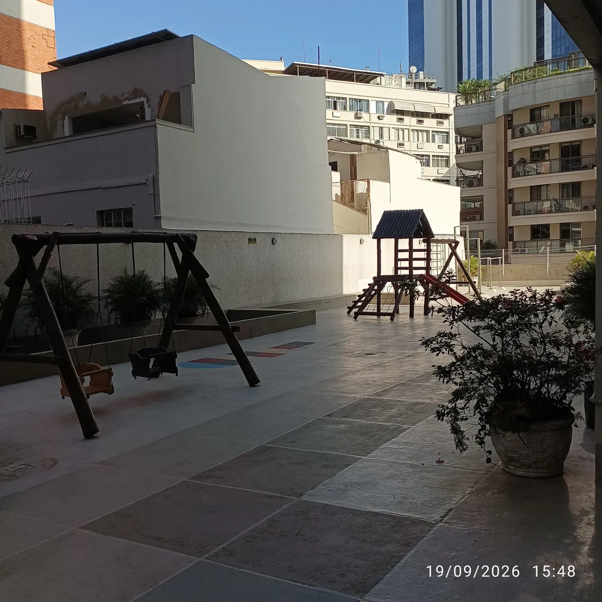 2-bedroom apartment in a building with a pool — photo 18