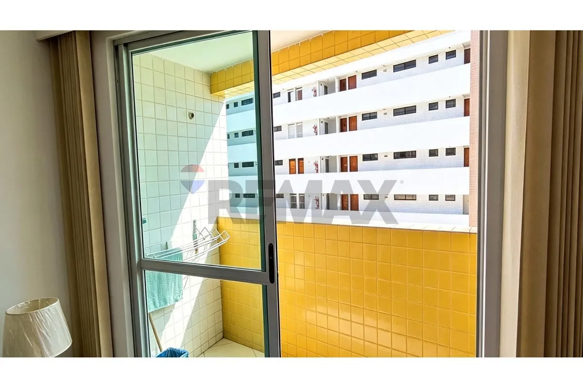 One-bedroom apartment in a building with a pool — photo 8