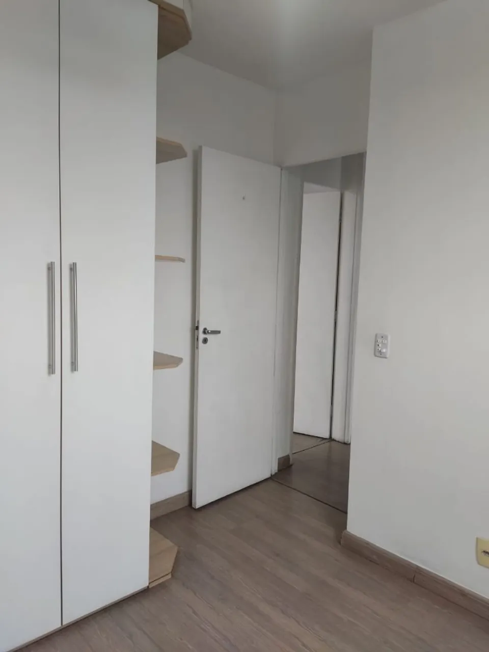 2-bedroom apartment in a building with a pool — photo 10