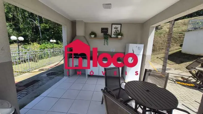 2-bedroom apartment in a building with a pool — photo 2