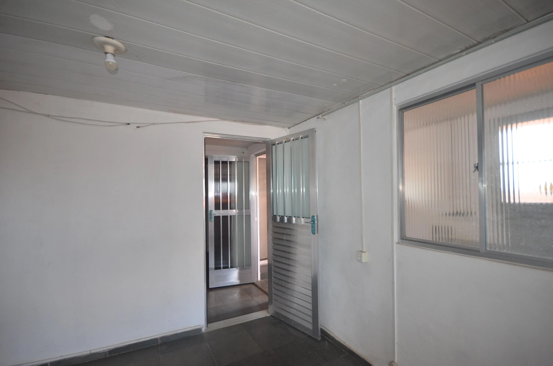 1-bedroom rental apartment with a compact kitchenette — photo 12