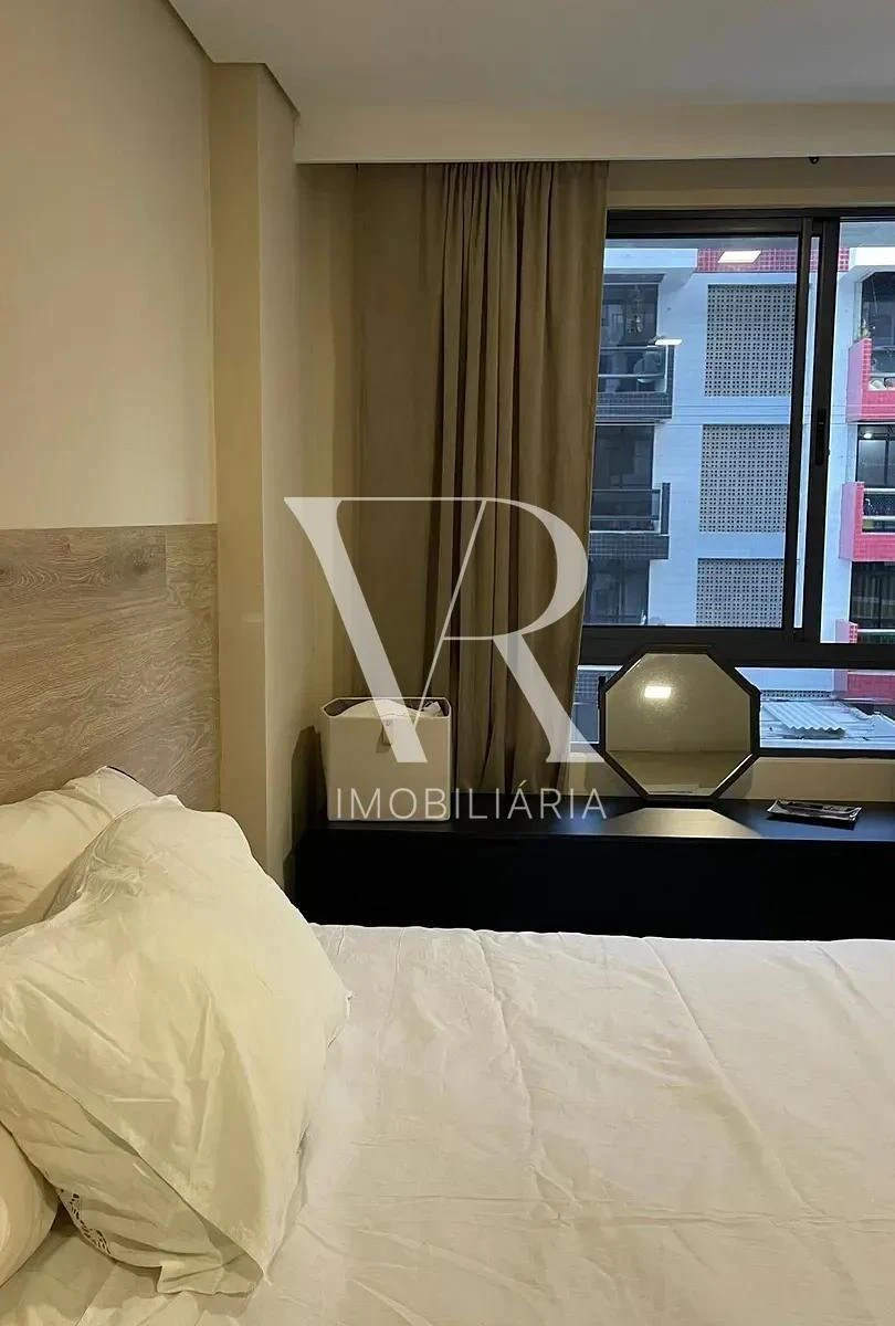 2-bedroom apartment in a building with a pool — photo 7