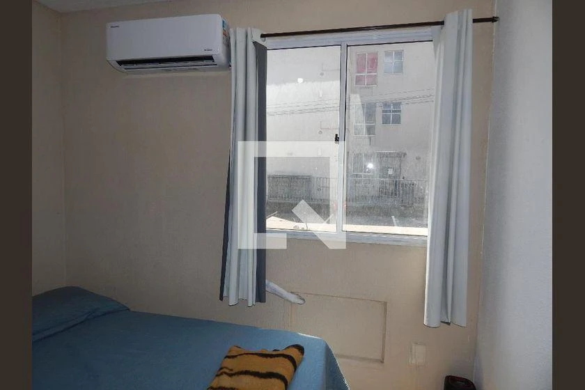 2-bedroom apartment in a building with a pool — photo 4
